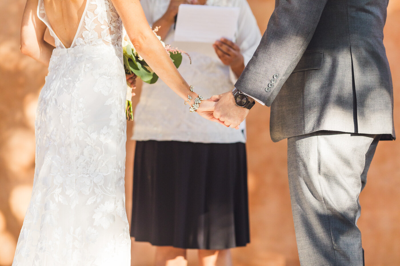 bride-and-groom-holding-hands.jpg
