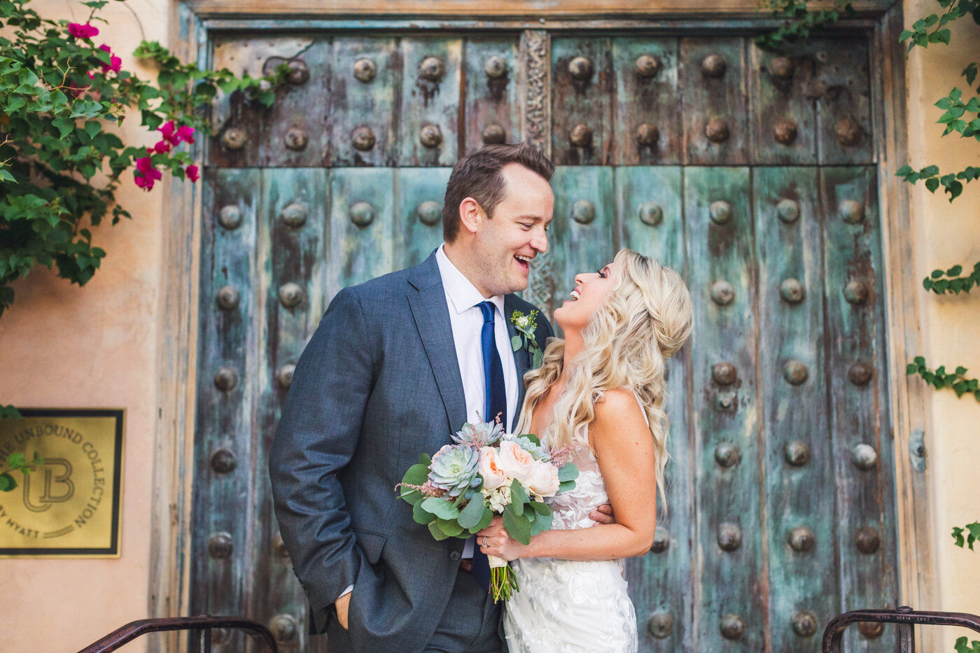 bride-and-groom-laughing-during-portraits.jpg
