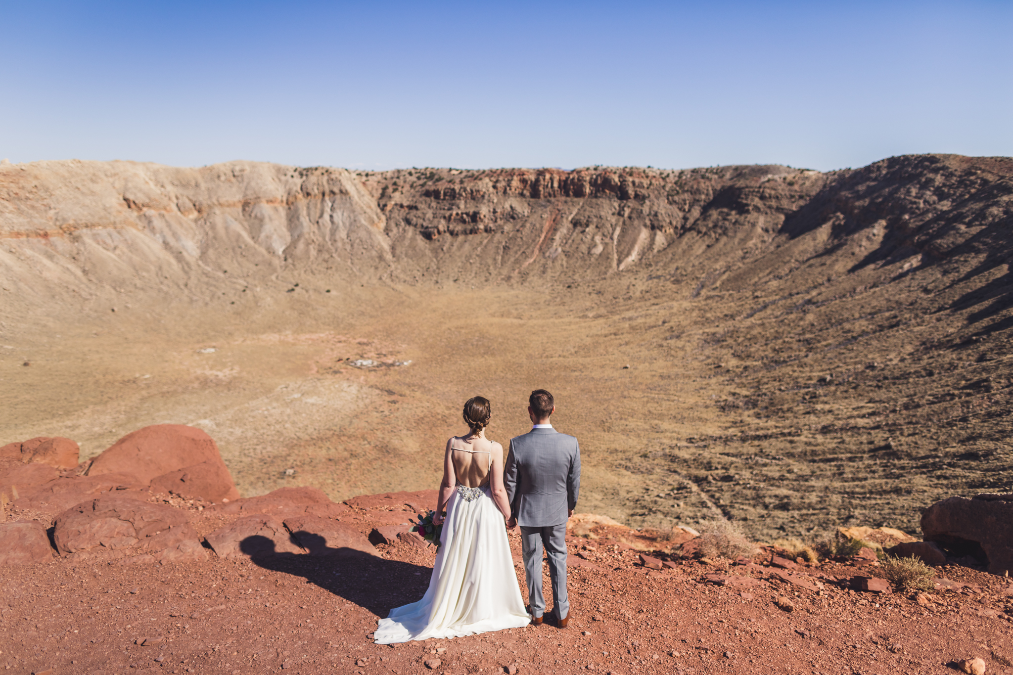 Location: Meteor Crater, Winslow, AZThese two got married at a meteor crater! How cool is that? It was just the two of them, the officiant, the tour guide, and me. I signed as one of their witnesses.