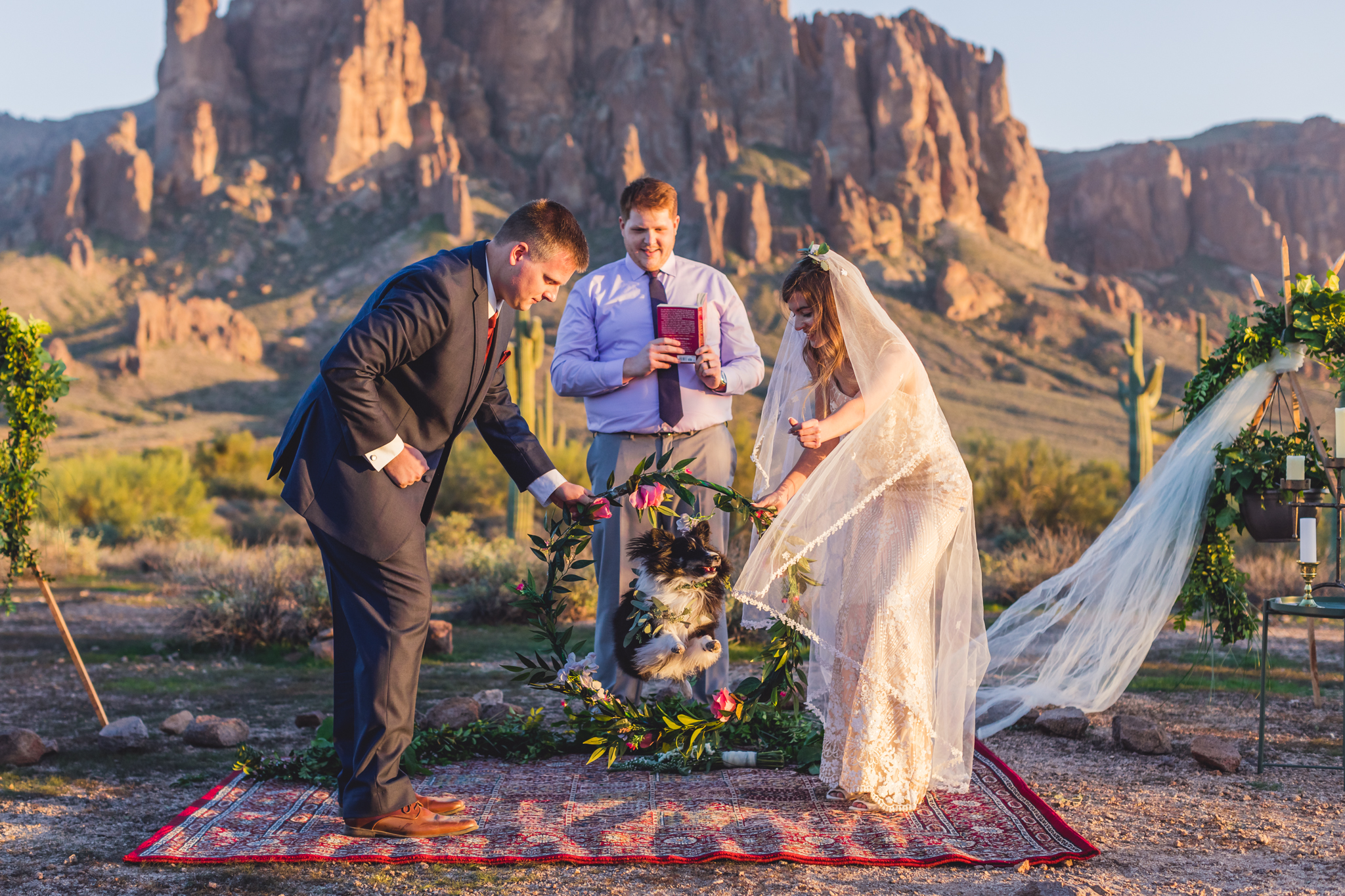 Location: Superstition Mountains, Apache Junction, AZI had to end with a dog shot. If you have a dog at your wedding, I want to be there. We had our dog as our ring bearer like these two. But they kicked it up a notch by having him jump through a ri…